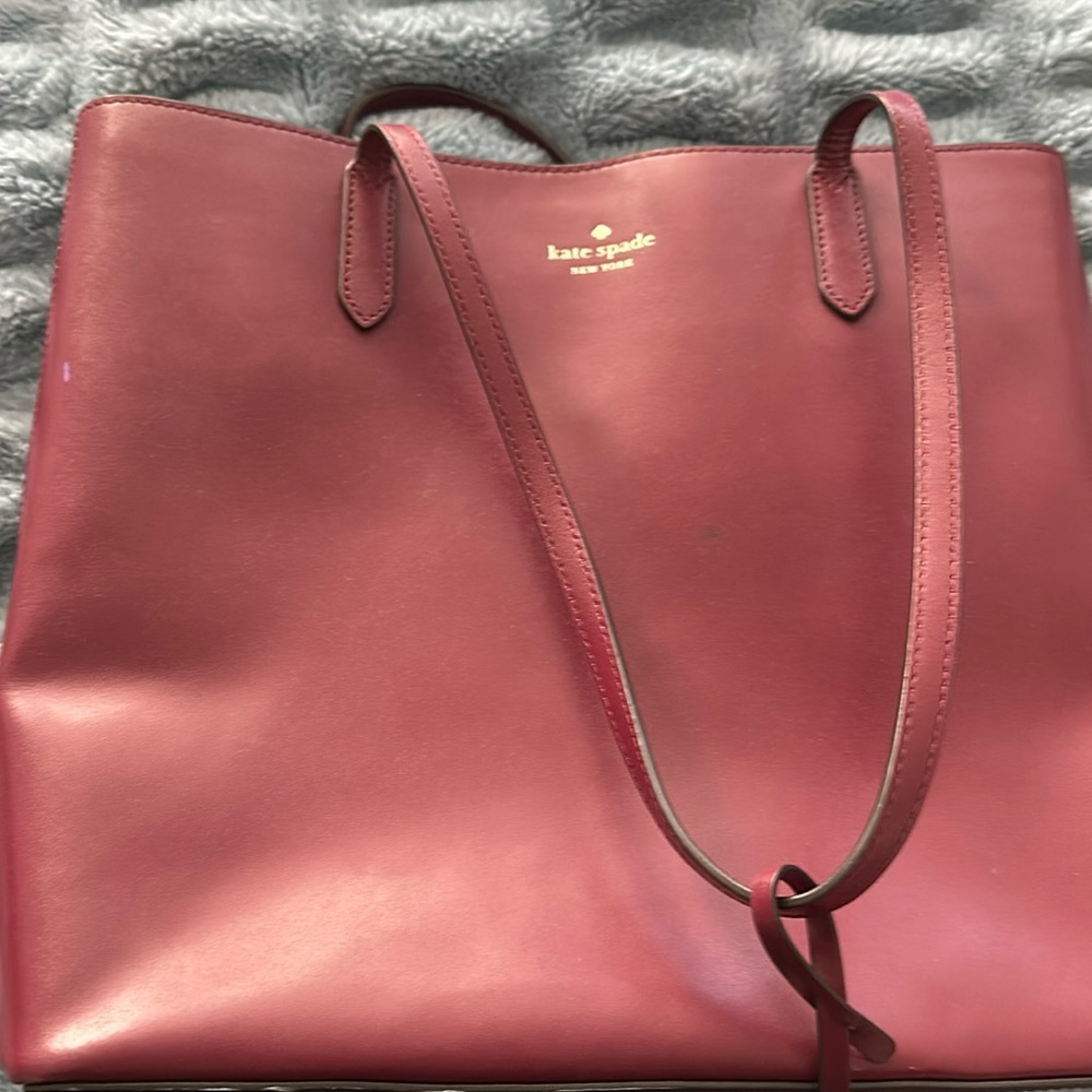 Barley used Kate spade burgundy purse.